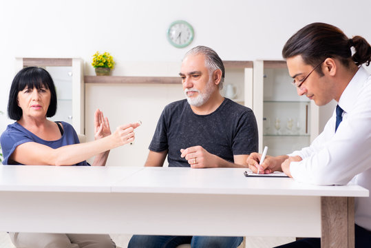 Financial advisor giving retirement advice to old couple