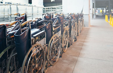 Many Row of old wheelchair standing in hotpital