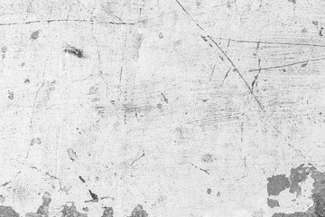Texture of a concrete wall with cracks and scratches which can be used as a background