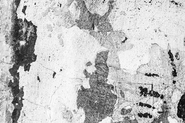 Texture of a concrete wall with cracks and scratches which can be used as a background