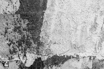 Texture of a concrete wall with cracks and scratches which can be used as a background