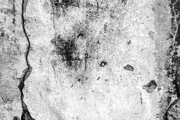 Texture of a concrete wall with cracks and scratches which can be used as a background