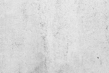 Texture of a concrete wall with cracks and scratches which can be used as a background