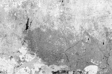 Texture of a concrete wall with cracks and scratches which can be used as a background