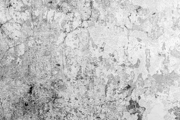 Texture of a concrete wall with cracks and scratches which can be used as a background