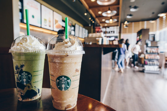 CHIANG RAI, THAILAND- July-02-2017 : A Venti Starbucks frappuccino Irish coffee and Green tea latte frappuccino in Starbucks coffee shop.