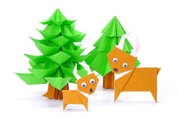 Origami paper art : Santa Claus, reindeer and Christmas tree for greeting season of Christmas and New year. Copy space