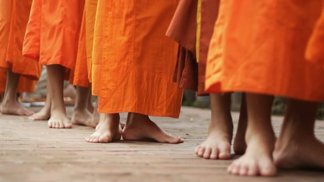 a group of monks walking 