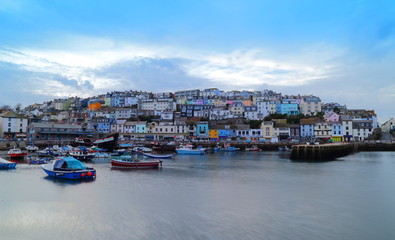 Colorful buildings in a small fishing town of Brixham in the county of Devon, in the south-west of England.