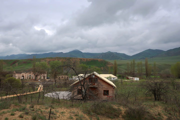 Old railroad and railway station view near Sarykum sand dunes, Dagestan, Russia