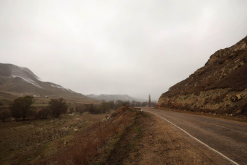 Scenic misty mountain road in Dagestan view, Russia