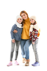 Happy family in autumn clothes on white background