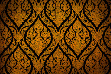 Closeup Thai pattern carving lotus picture at door in temple