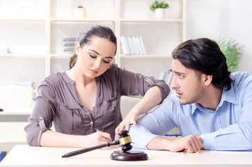 Fototapeta premium Young family in marriage divorce concept