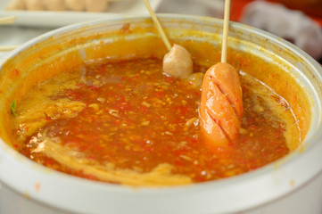 Grilled meatballs with dipping sauce
