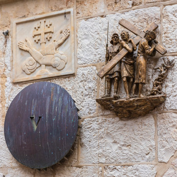 Closeup view on the symbols at fives station on Via dolorosa