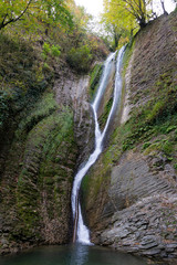 Fototapeta na wymiar Orekhovsky waterfall is a tourist attraction near the city of Sochi, Russia. Clear day 29 October 2019