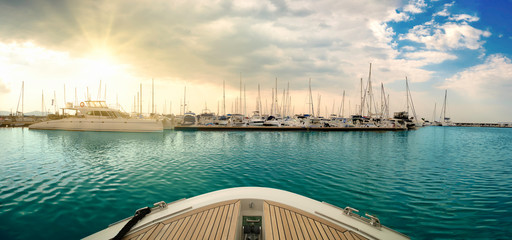 A luxury yatch alongside at the jetty of yatch. © Amarinj