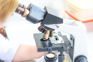Medical staff at the laboratory perform blood tests.