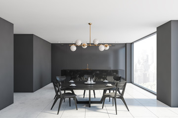 Black marble kitchen and dining room interior