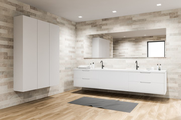 Light tile bathroom corner with sink and wardrobe