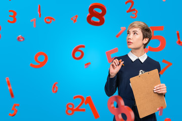 Asian woman with clipboard, numbers on blue