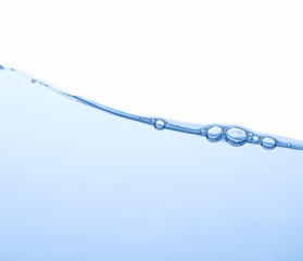 Water splash with bubbles of air and wave