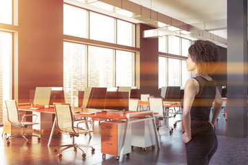 African American woman in gray office