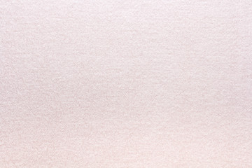 Knitted pink fabric cashmere texture, stockinette stitch