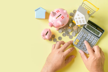 Man use calculators to calculate And analyze financial expenses.