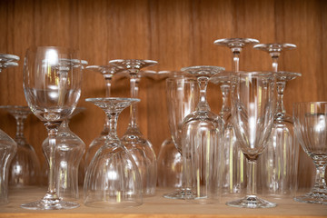 different wine glasses in  cabinet
