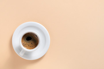 Cup with coffee on a saucer