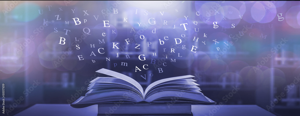 Poster imagine opening an old book blurred with magic power on the table and the english alphabet floating 