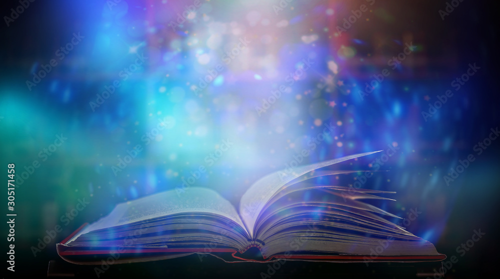 Poster imagine a picture book of an ancient book opened on a wooden table with a sparkling golden backgroun