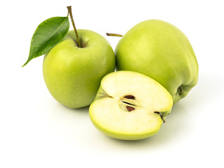 Green apples with leaves isolated on white background