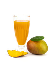 Mango smoothie in high glass served with slided mango isolated on white background. Mango shake shooting in studio. Image with path. Organic tropical fruits on summer concept.