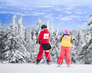 Fototapeta na wymiar Ski school on mountain peak