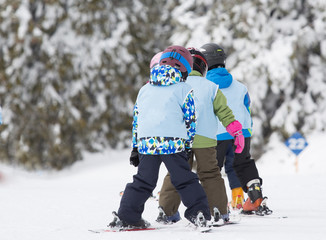 Ski school for kids on slope