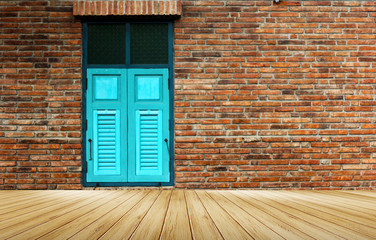 Wood floor for space use area have blur background brick wall and has a window light blue
