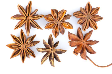 Star anise spice fruits and seeds isolated on white background