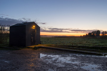 Obraz na płótnie Canvas Barn on sunset