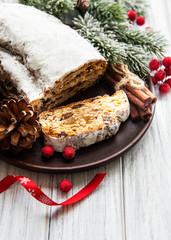 Christmas stollen on wooden background