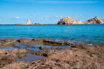 Store enrouleur occultant Cala Pregonda, île de Minorque, Espagne Cala Pregonda, une des plus belles plages de Minorque, îles Baléares