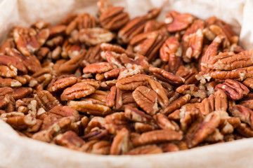 Image of dark pecan in container