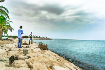 Fototapeta premium man on the beach beautiful landscape