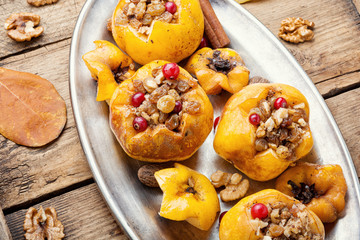 Baked quince stuffed with nuts