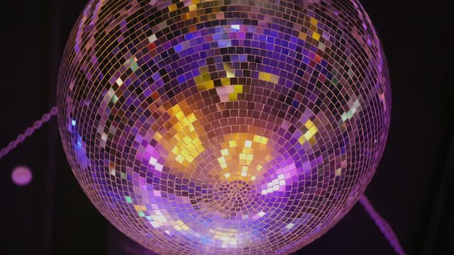 Rotating mirror disco ball. Dancing or party concepts