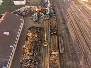 Recycling and recycling of scrap metal. Iron at the site of the processing plant. Aerial view.