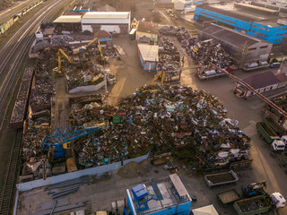 Recycling and recycling of scrap metal. Iron at the site of the processing plant. Aerial view.