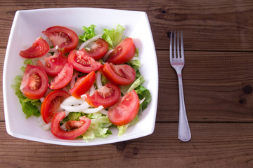 lettuce and tomato salad, diet and food concept
